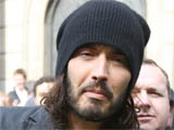 Russell Brand speaks to the press as he makes his way to the Bank of England in central London on the day the G20 begin discussions at the Excel centre, London