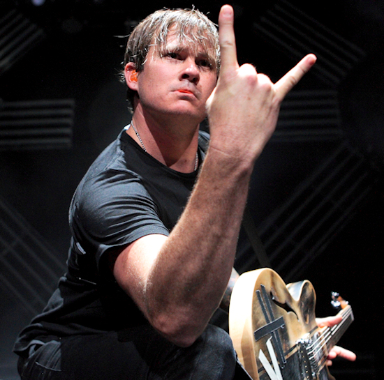 Tom DeLonge of Blink 182 performing with the band at the First Midwest Bank