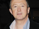 Louis Walsh and Simon Cowell outside the May Fair hotel for the Penthouse Party, after the live Saturday night 'X Factor' show London, England.