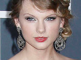 Taylor Swift looking stunning on the red carpet of the 52nd Annual Grammy Awards