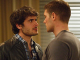 Syed and Christian argue with each other.