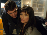 Tony holds Carla hostage.