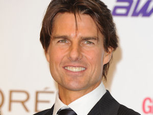 Tom Cruise with the Screen Icon award he won at last nights National Movie Awards held in London