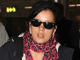 Lily Allen arriving at Dublin Airport pushing her grandfather Edward in a wheelchair through the terminal, Dublin