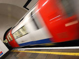 Tube train leaving a station
