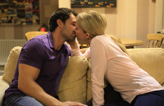 After a long talk about the past, Andy and Katie kiss