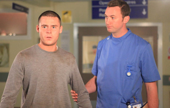 Aaron in the train crash aftermath on Emmerdale