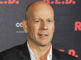Bruce Willis attends a photocall for the movie 'R.E.D'