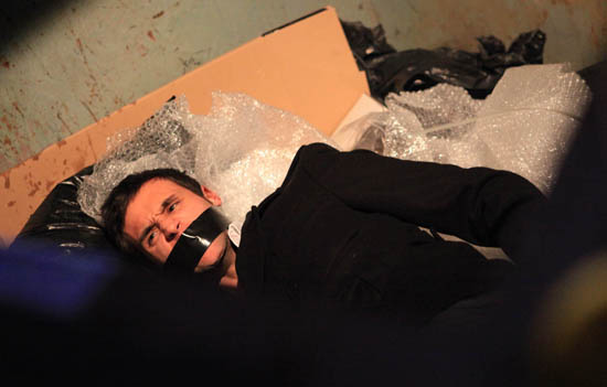 Nikhil Sharma (Rik Makarem) in a bin