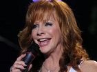 Reba McEntire receiving American Country Countdown NASH Icon Award