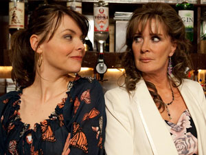Liz is shocked to see Tracy working behind the bar