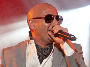 Rapper Pitbull performing on the Music Plaza stage during Mardi Gras