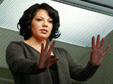 Grey's Anatomy S07E18 'Song Beneath The Song': Callie Torres looks on.