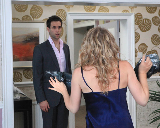 Charity is shocked when Nikhil comes home to find her in a revealing outfit