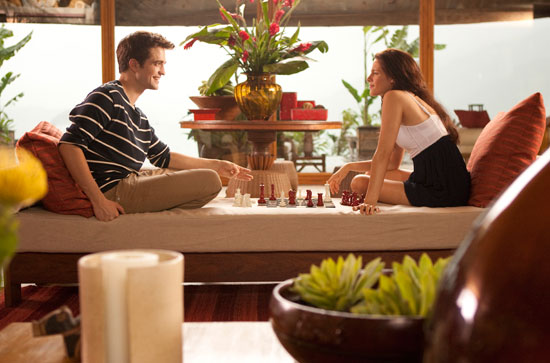 The couple engage in chess