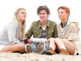 Maddie, Jonno and Tilly on the beach