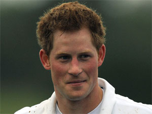 A muddy Prince Harry after a charity match of Polo, England