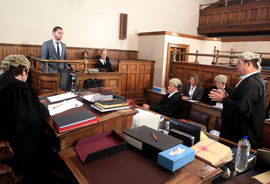 Its Aaron's turn in court but he doesn't seem interested when questioned