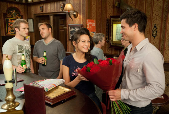 Tommy is jealous when Dr Carter arrives with flowers for Tina