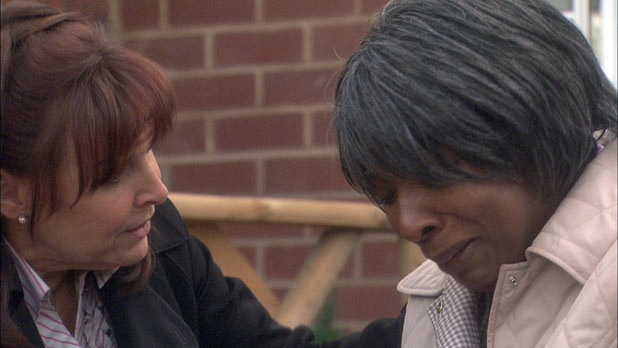 Julia Parsons (Diane Keen) and Mrs Tembe (Lorna Laidlaw) find the body