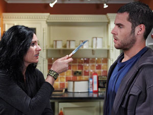 Chas takes a knife out and threatens to harm herself