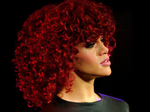 A new waxwork of Rihanna is unveiled at Madame Tussauds in London