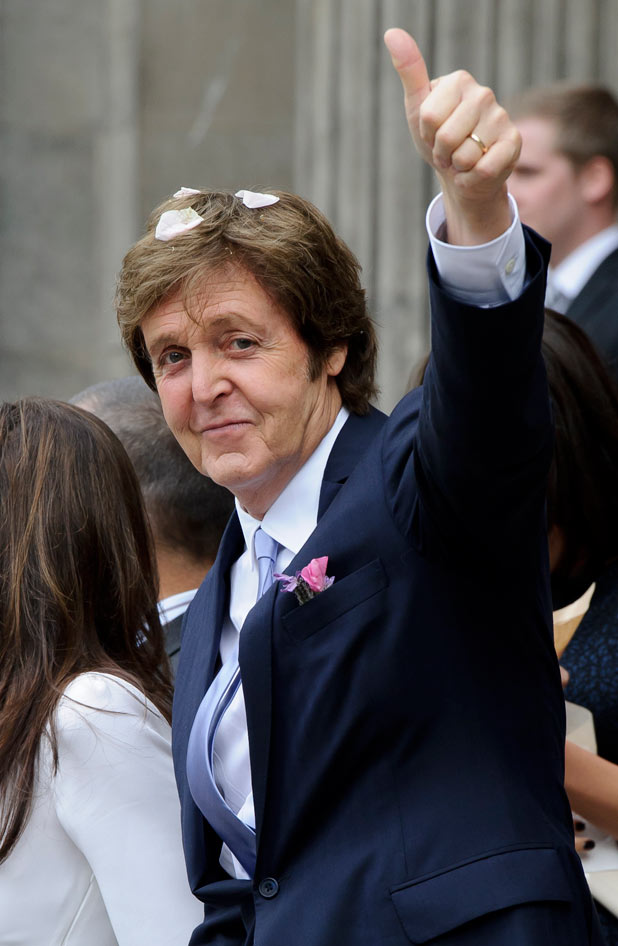 Sir Paul gives his trademark thumbs-up