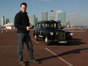 Dr James Brighton and Colin Murray unveil the world's first remote controlled black cab in London