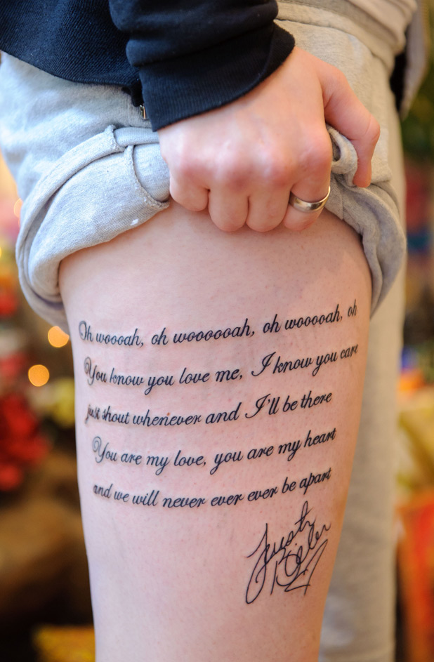 lyrics tattooed on her leg