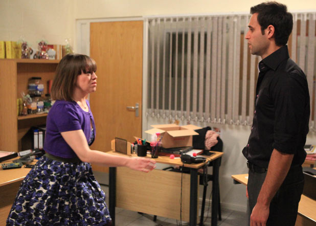 Gennie Walker (Sian Reese-Williams) and Nikhil Sharma (Rik Makarem) kiss