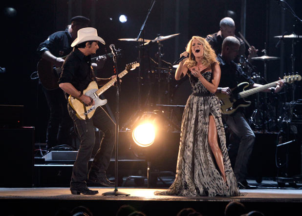 Hosts Brad Paisley and Carrie Underwood duet on 'Remind Me'.
