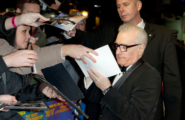Director Martin Scorsese signs autographs