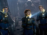 Logan Marshall-Green, Noomi Rapace and Michael Fassbender explore a distant planet.