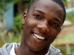 Neil Cooper - played by Tosin Cole