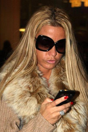 Katie Price
arriving at London Heathrow Airport, London