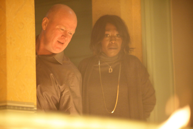 Phil and Denise in the burning B&B