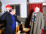 A suspicious Sandy questions Ashley in the church about his plans to take Laurel away to Leeds