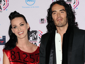 Katy and Russell appear for the first time as husband and wife