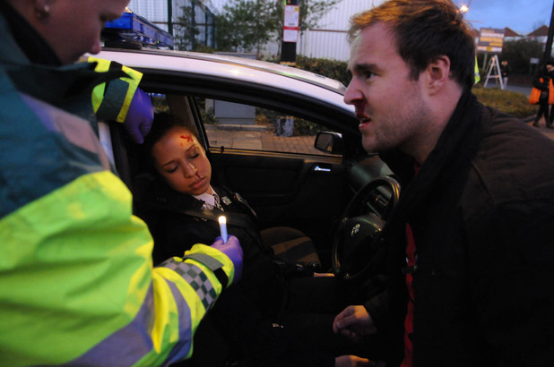 The paramedics arrive at the scene of the crash to see if anyone is seirously hurt