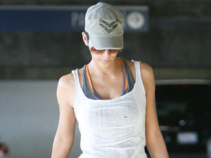 Halle Berry leaves a medical building in Santa Monica wearing a see through t-shirt and a sequined corporal stripe baseball cap.
Los Angeles