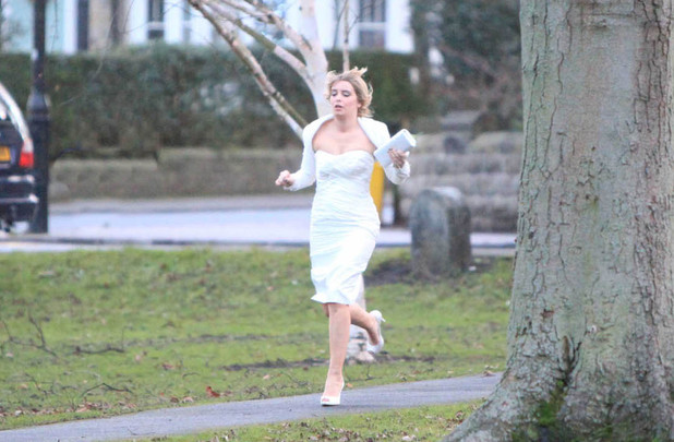 Charity Tate (Emma Atkins) rushes to make her wedding on time
