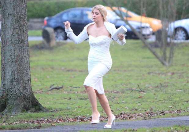 Charity Tate (Emma Atkins) rushes to make her wedding on time