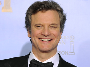 Actor Colin Firth poses backstage during the 69th Annual Golden Globe Awards