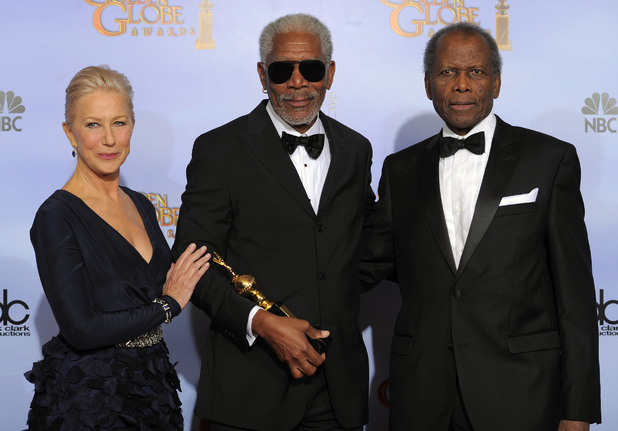 Morgan Freeman, center, poses backstage with the Cecil B. Demille Award with Helen Mirren, left, and Sidney Poitier, right, during the 69th Annual Golden Globe Awards