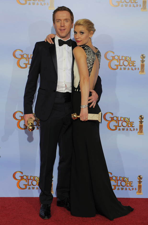 Homeland star Claire Danes celebrates her awards win with co-star Damian Lewis
