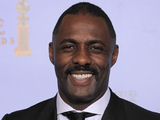 A smiling Idris Elba, who was recognised for his role in Luther