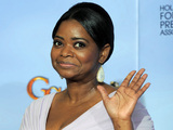 The Help's Octavia Spencer - winner of 'Best Supporting Actress In A Motion Picture' - waves to photographers