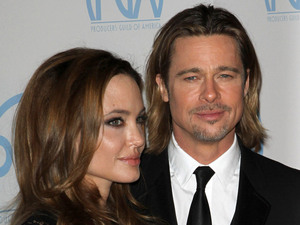Angelina Jolie and Brad Pitt The 23rd Annual Producers Guild Awards held at The Beverly Hilton Beverly Hills, California 