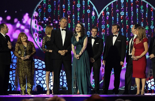 Cast and crew of Downton Abbey collect the Best Drama award on stage during the 2012 NTA Awards