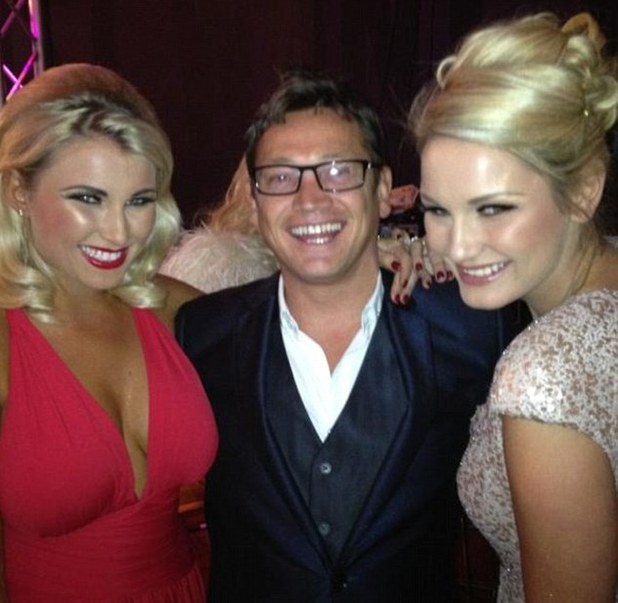 TOWIE's Billie and Sam Faiers smile excitedly as they pose with EastEnder's
